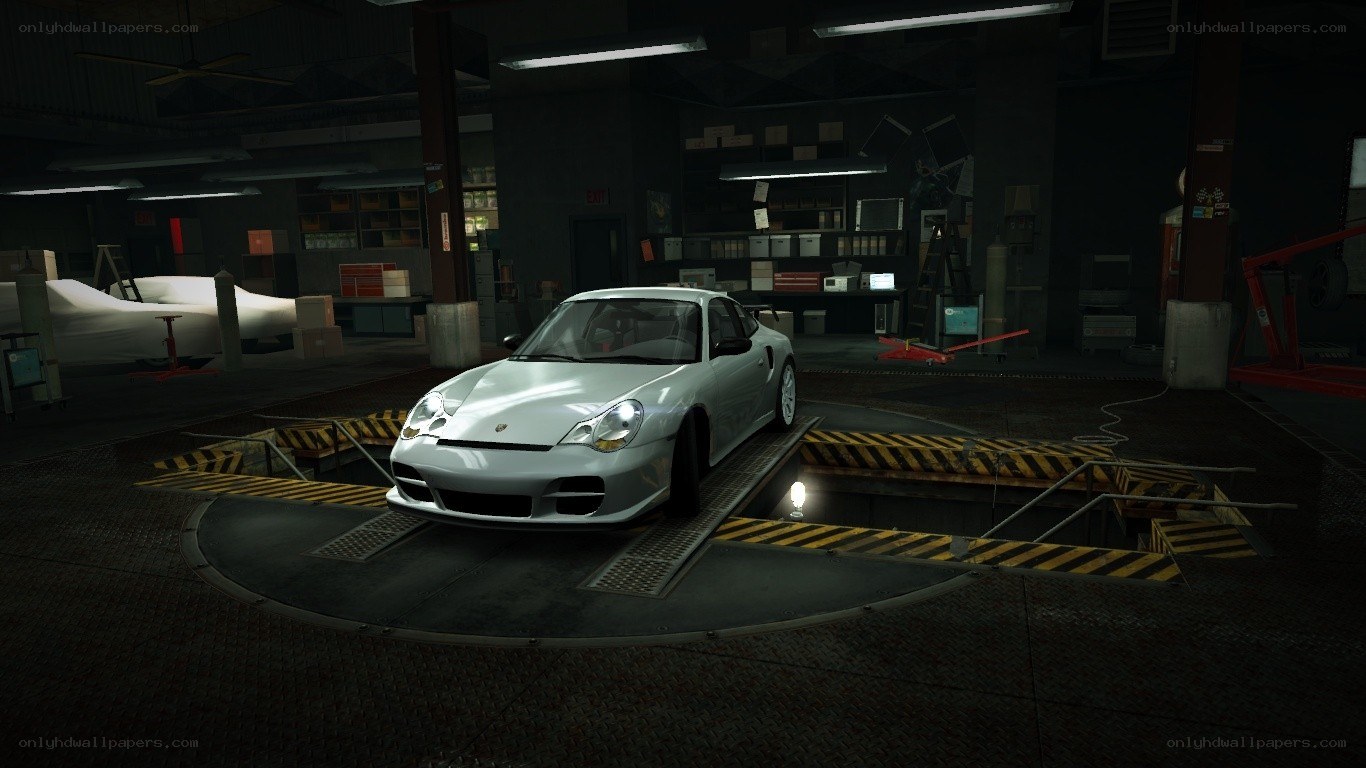 white porsche in garage