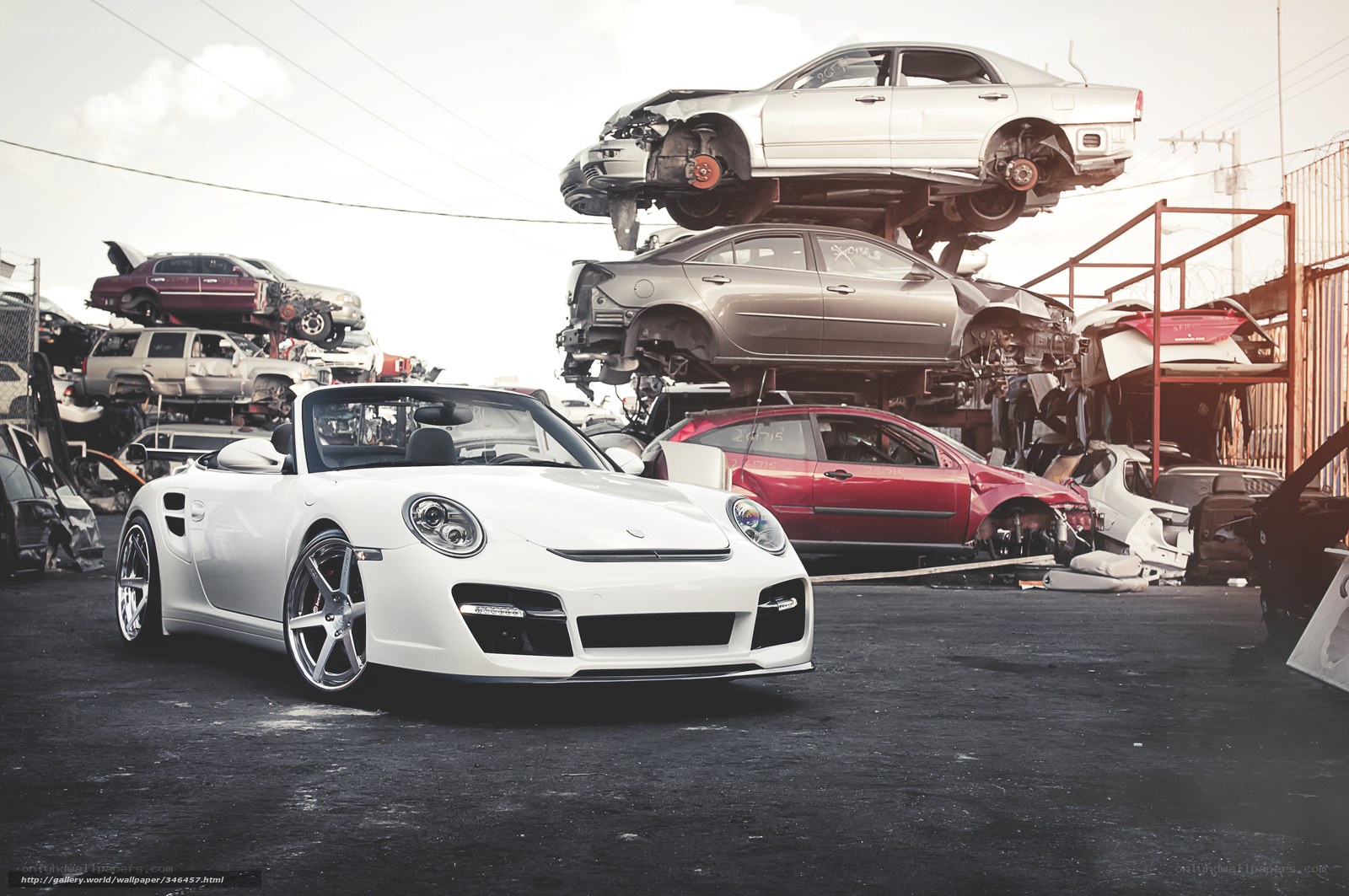 White Porsche in junkyard