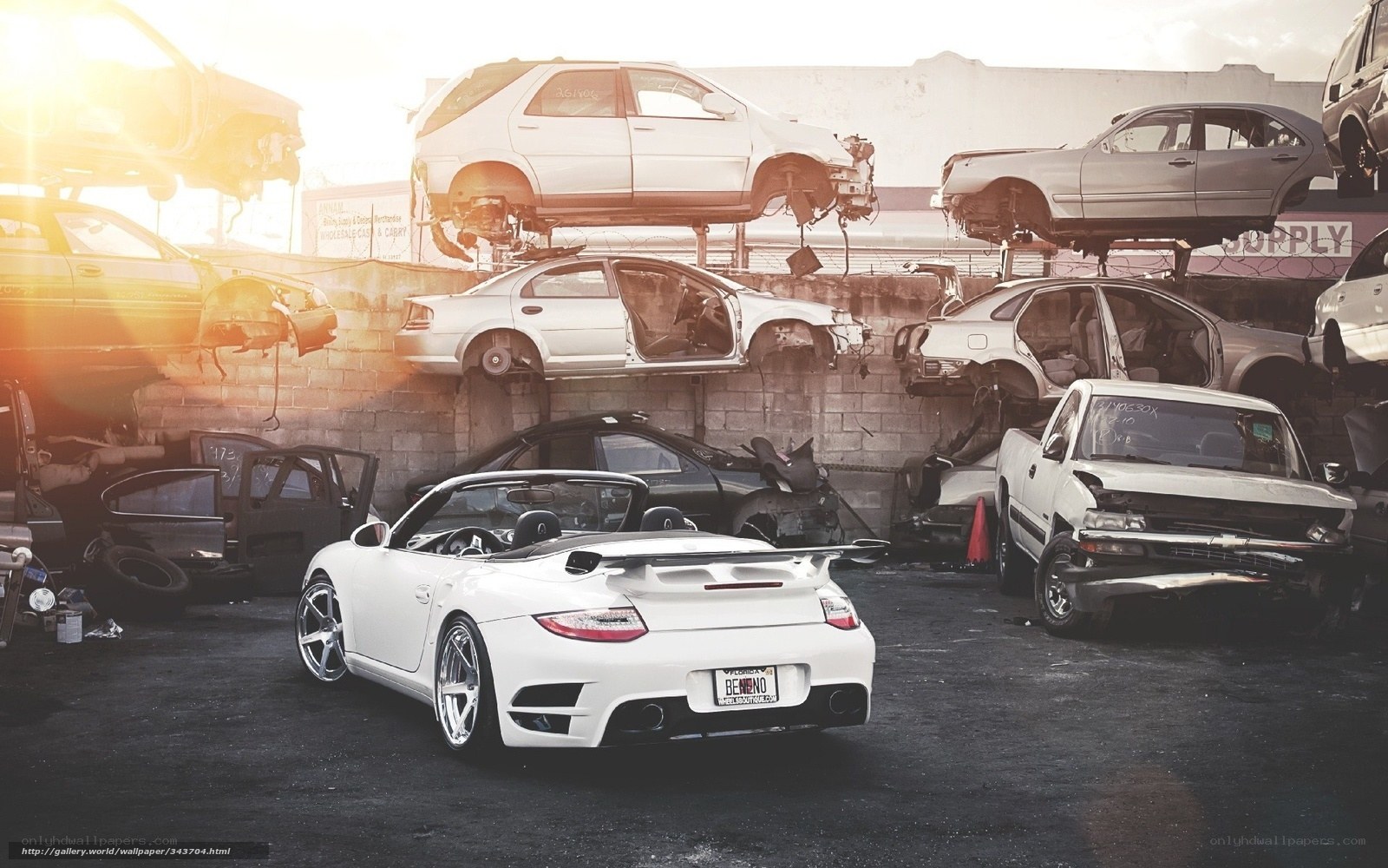White Porsche in junkyard