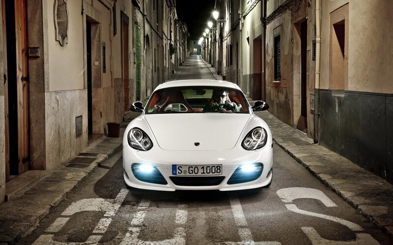 White Porsche in narrow alley