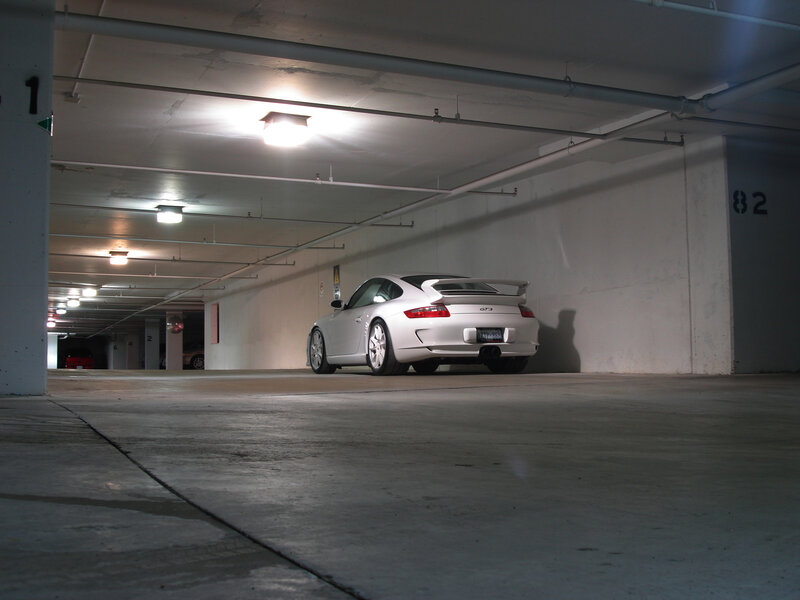 White Porsche in parking garage