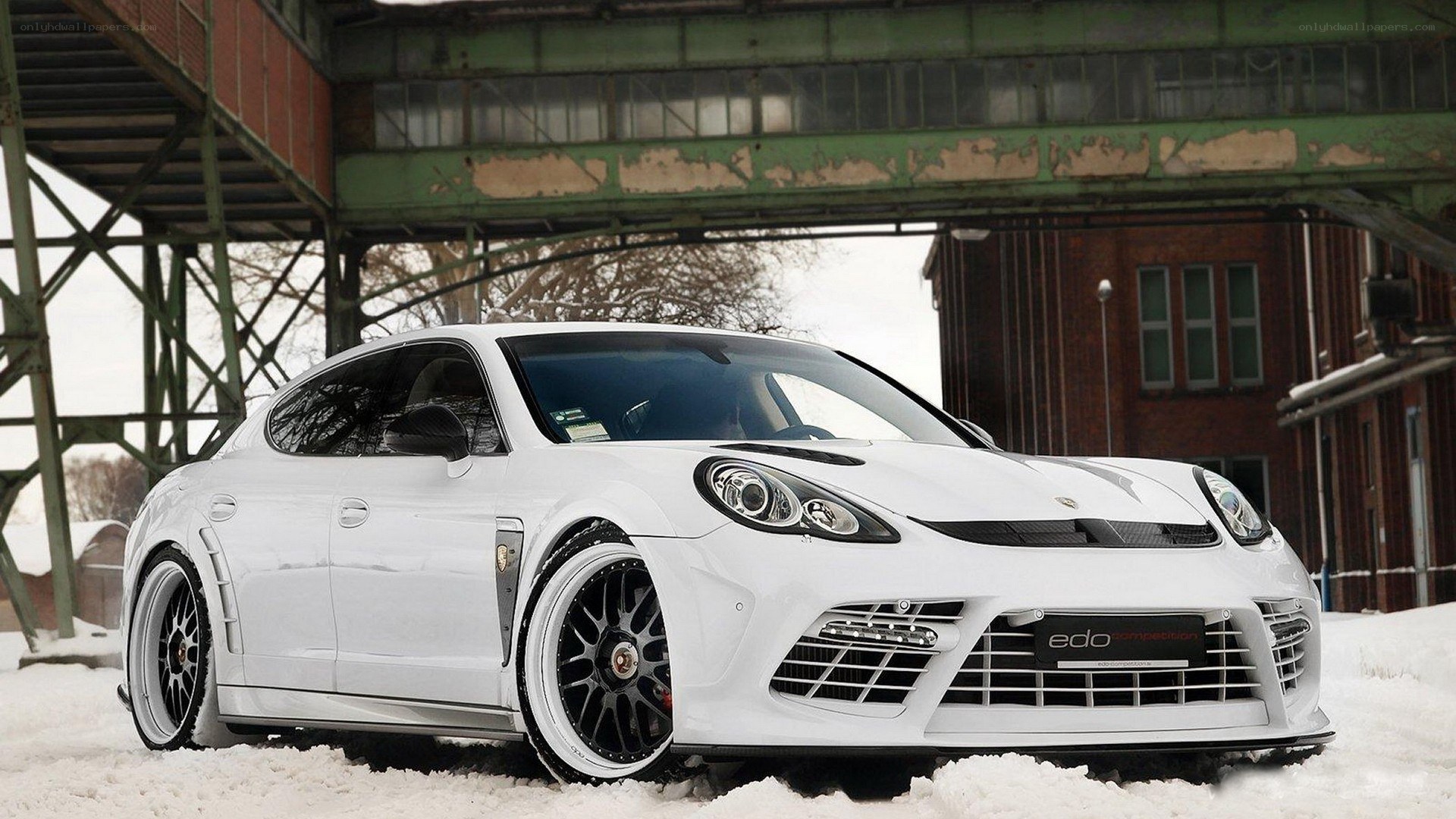 white porsche in snow