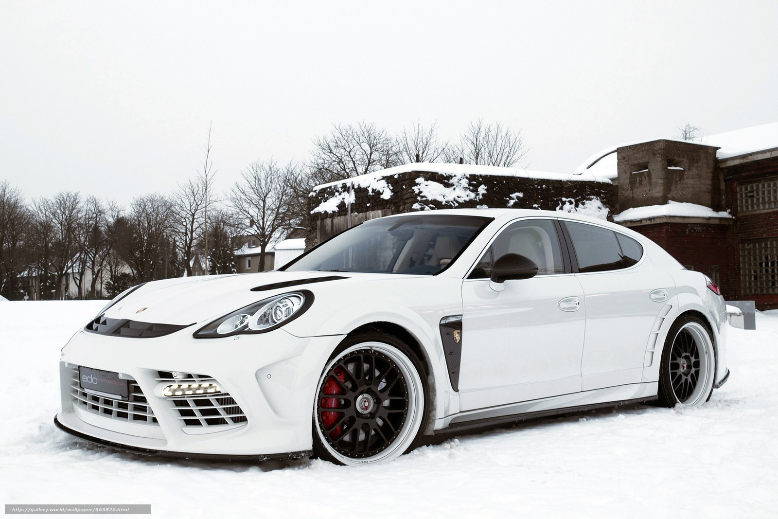 white porsche in snow