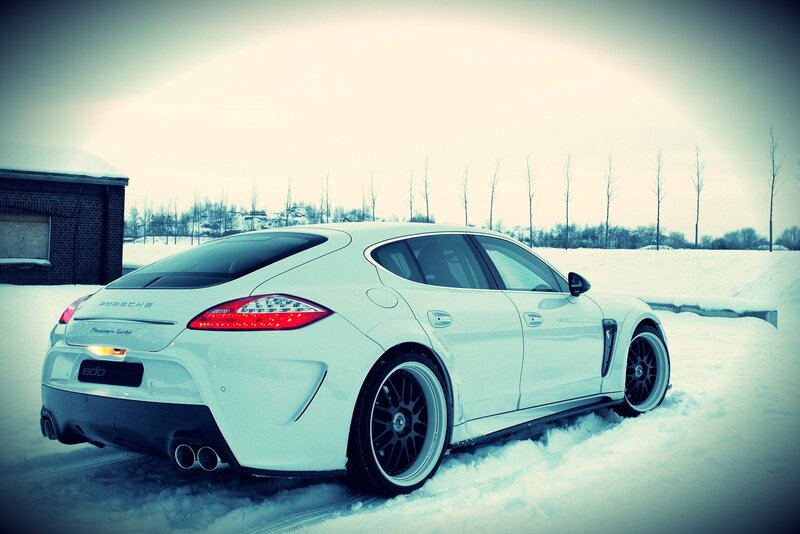 White Porsche in snowy landscape