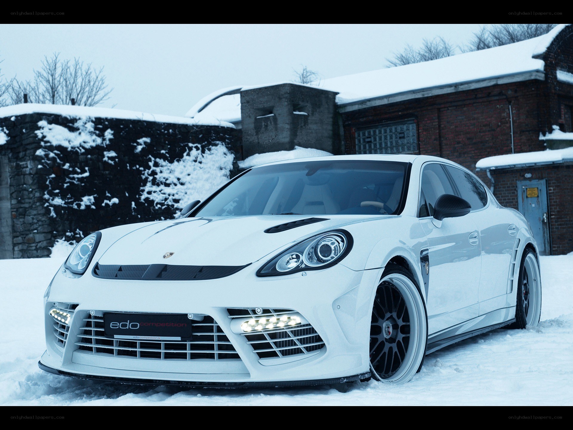 White Porsche in snowy setting