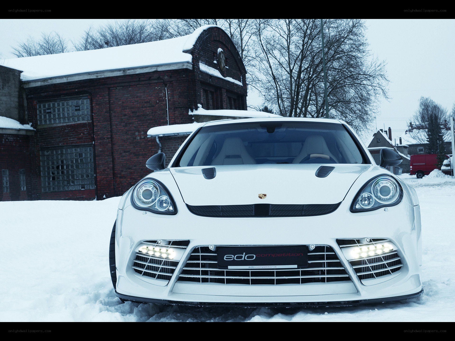 White Porsche in snowy setting