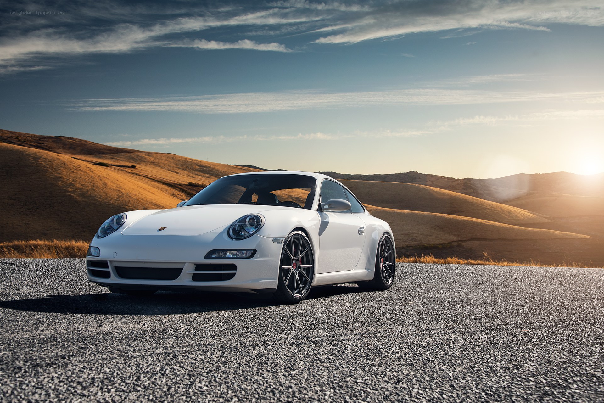 White Porsche on a desert road