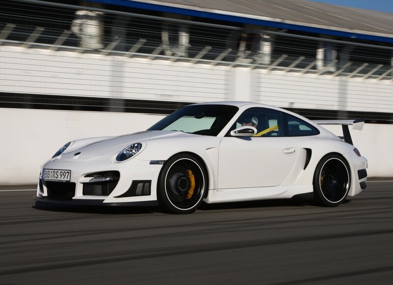 White Porsche on a racetrack