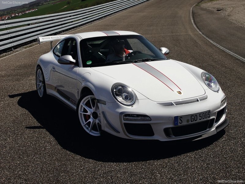 White Porsche on a racetrack