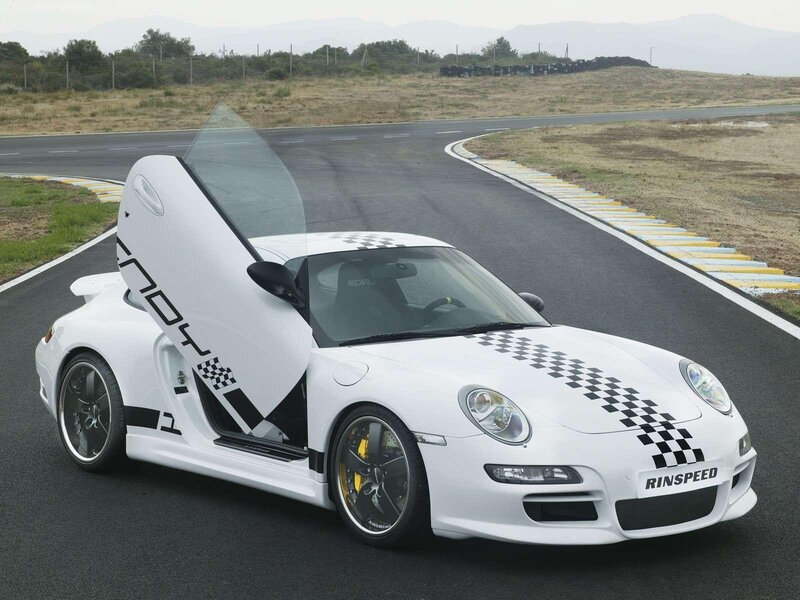 White Porsche on a racetrack