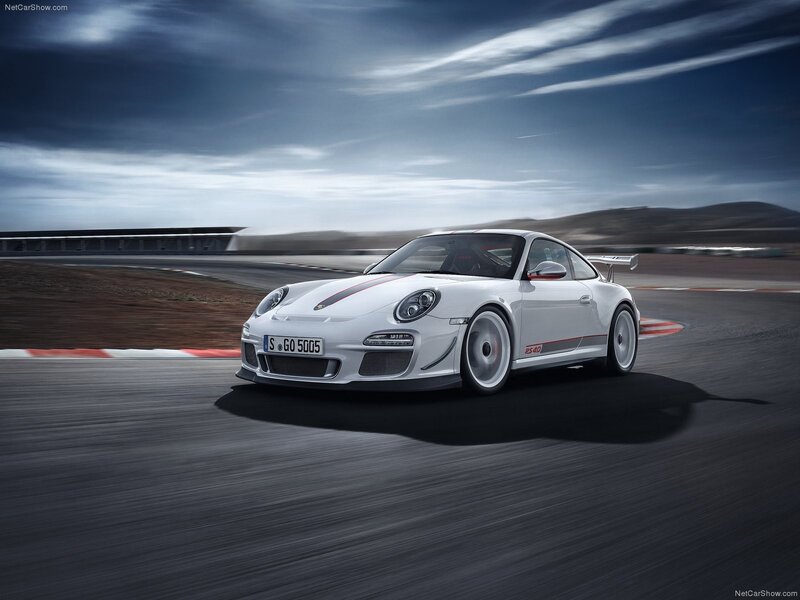 White Porsche on a racetrack