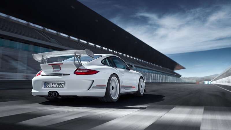 White Porsche on a racetrack