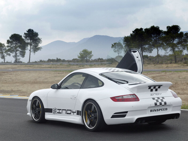 White Porsche on a racetrack