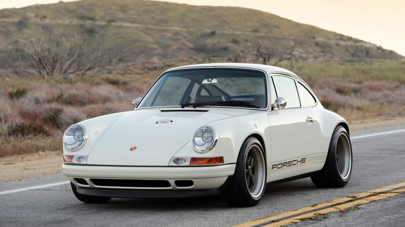 white porsche on a road