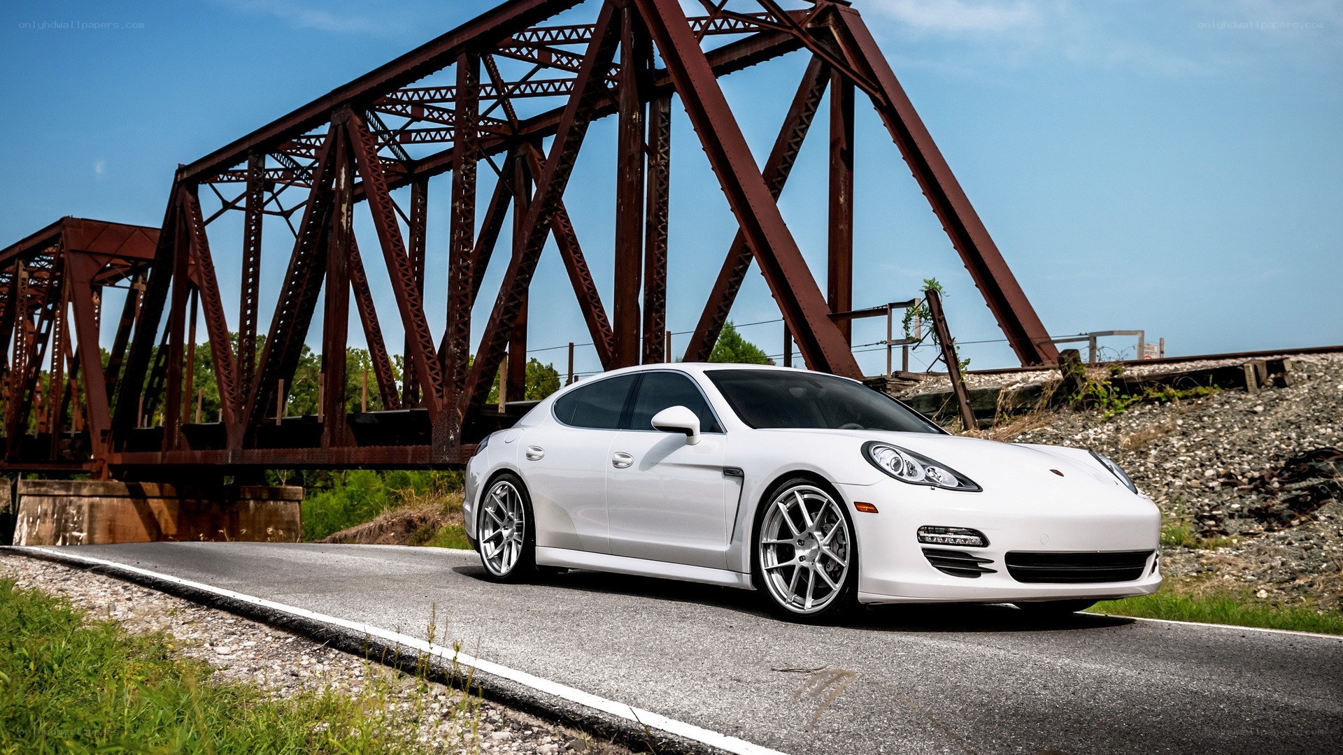 White Porsche on a road