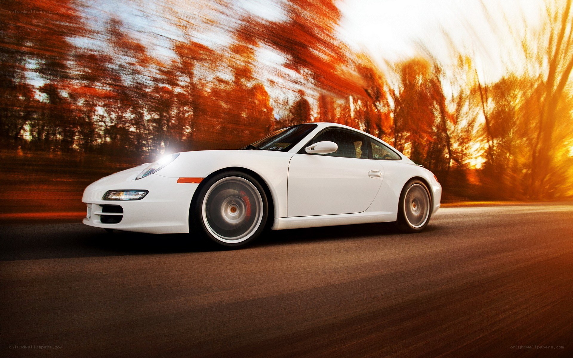 White Porsche on a road
