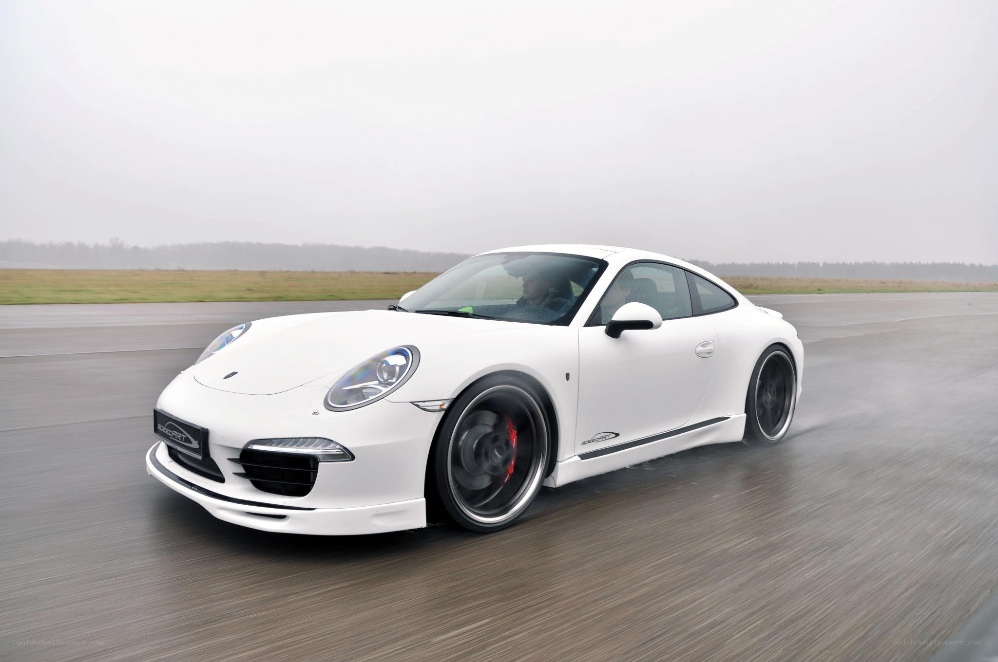 white porsche on a track