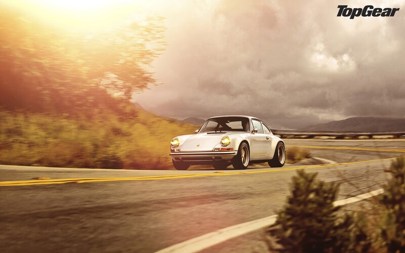 White Porsche on a winding road