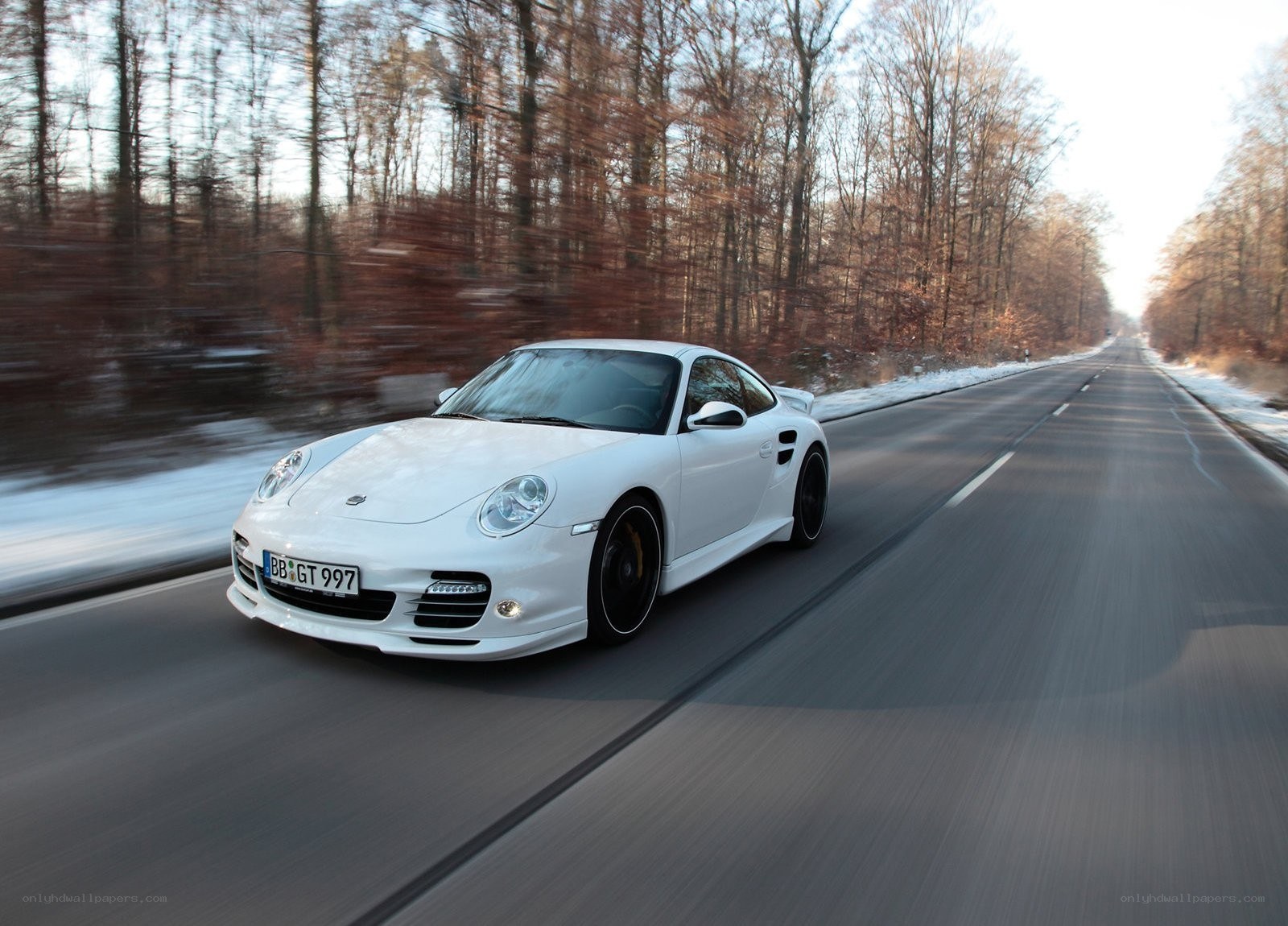 White Porsche on a winter road