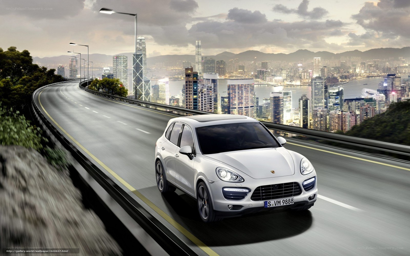 White Porsche on city highway