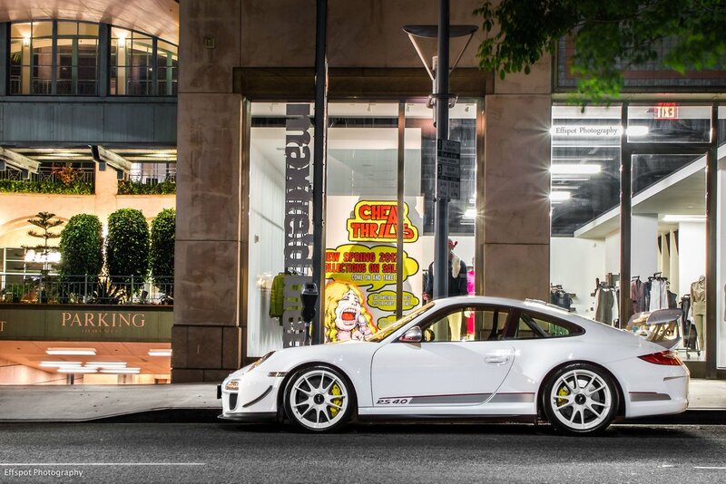 White Porsche on city street