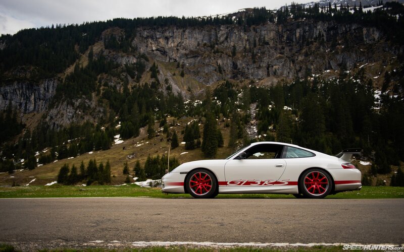 White Porsche on mountain road