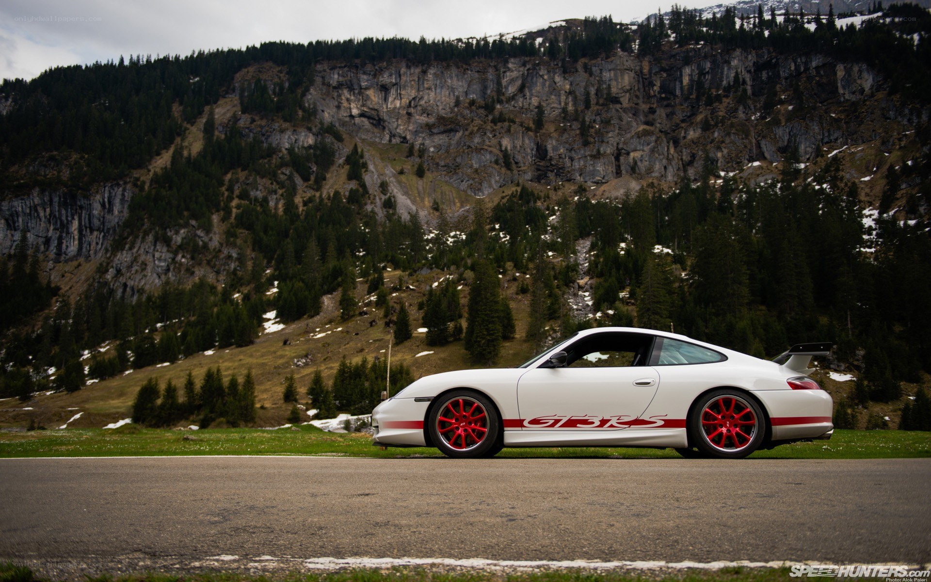 White Porsche on mountain road