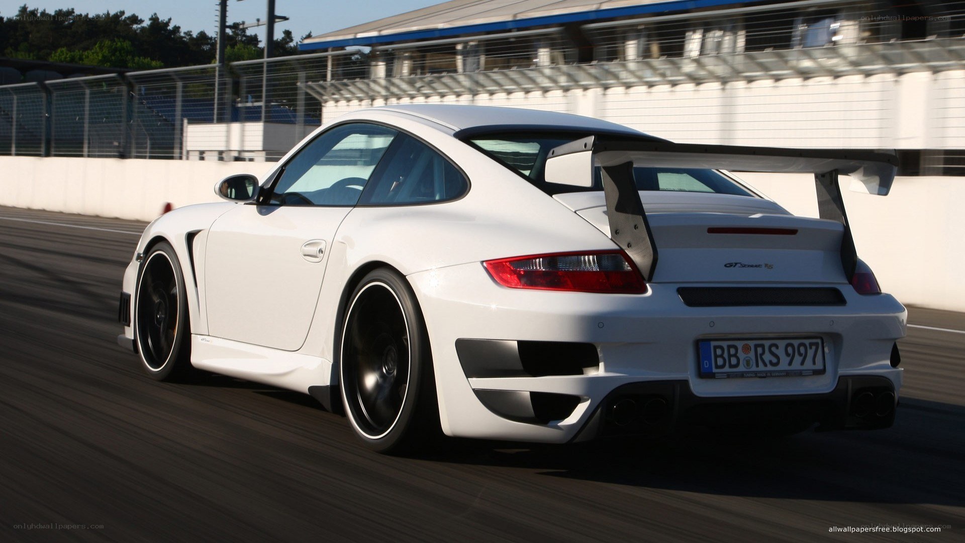 white porsche on racetrack