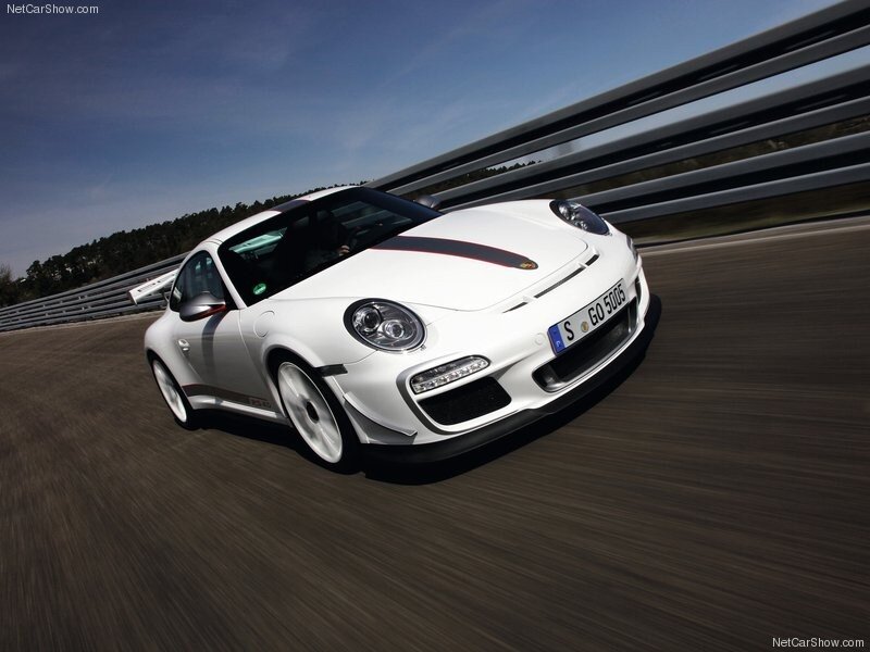 white porsche on racetrack