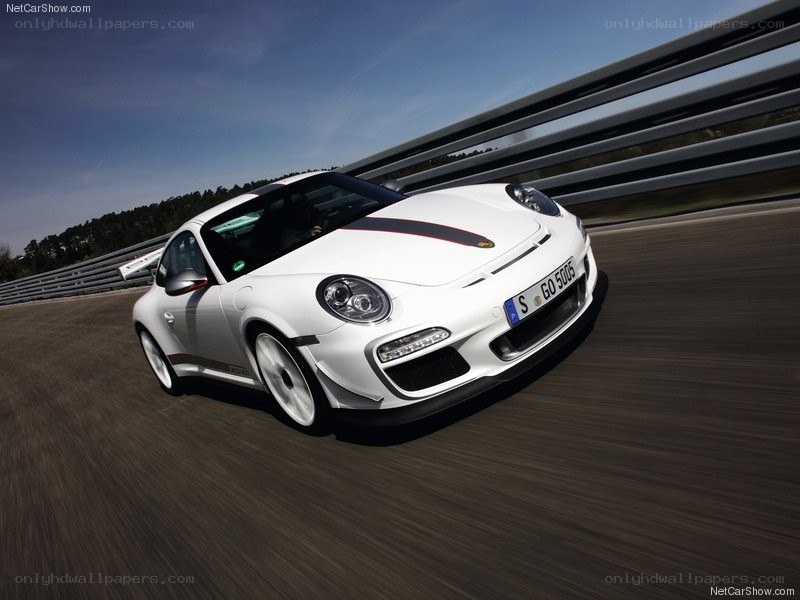 white porsche on racetrack