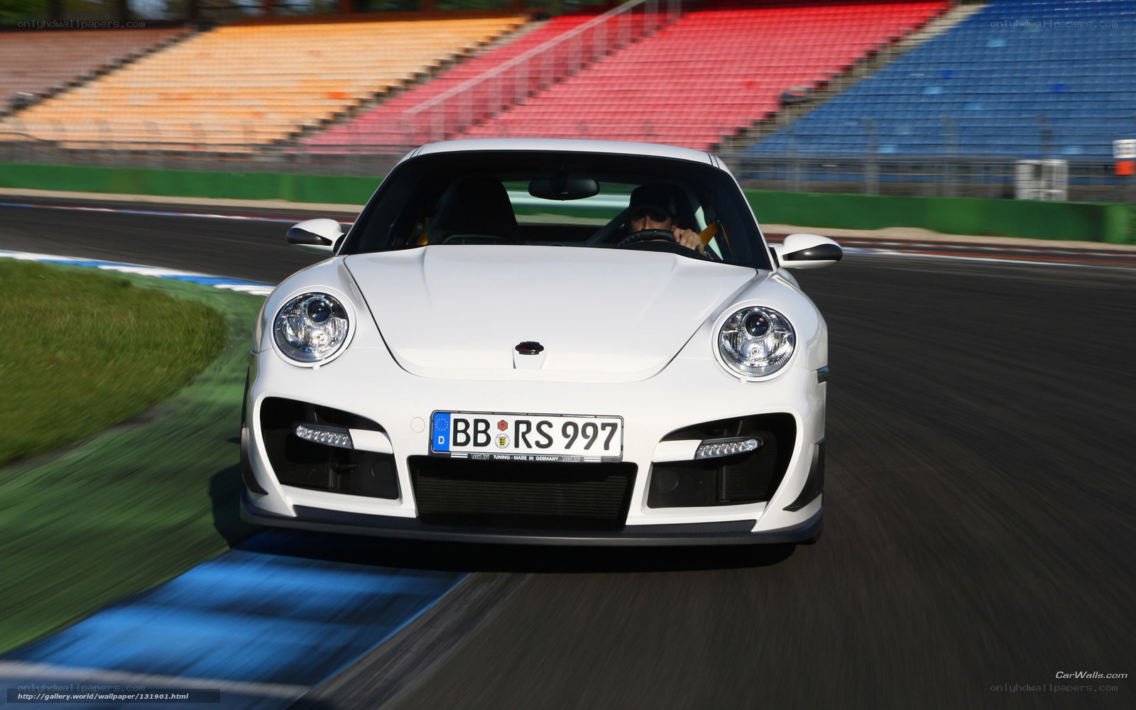 white porsche on racetrack