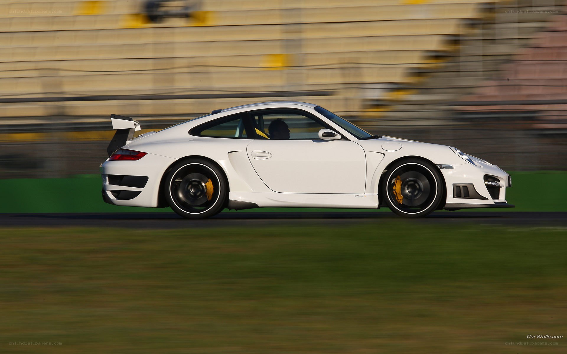white porsche on racetrack