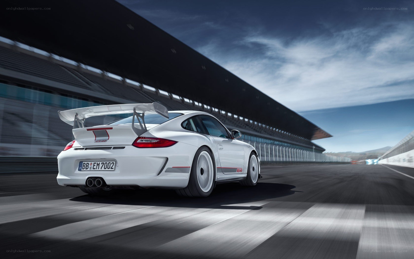 white porsche on racetrack