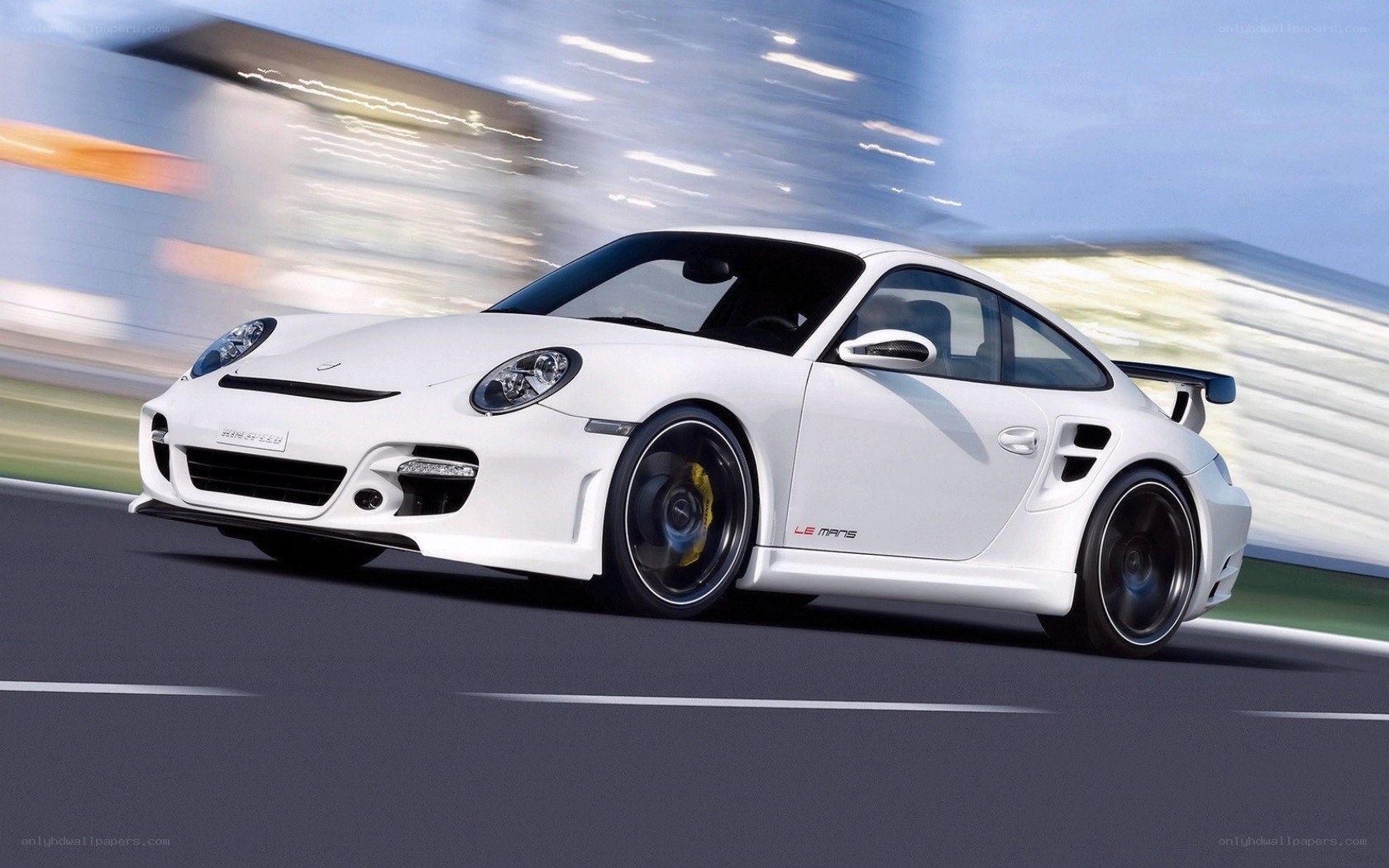 white porsche on racetrack