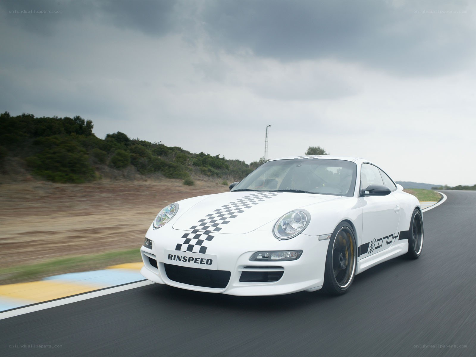 white porsche on racetrack