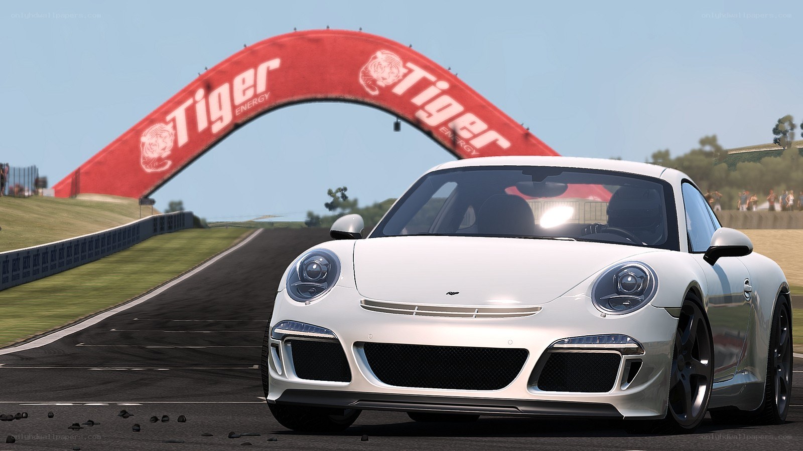 White Porsche on racetrack