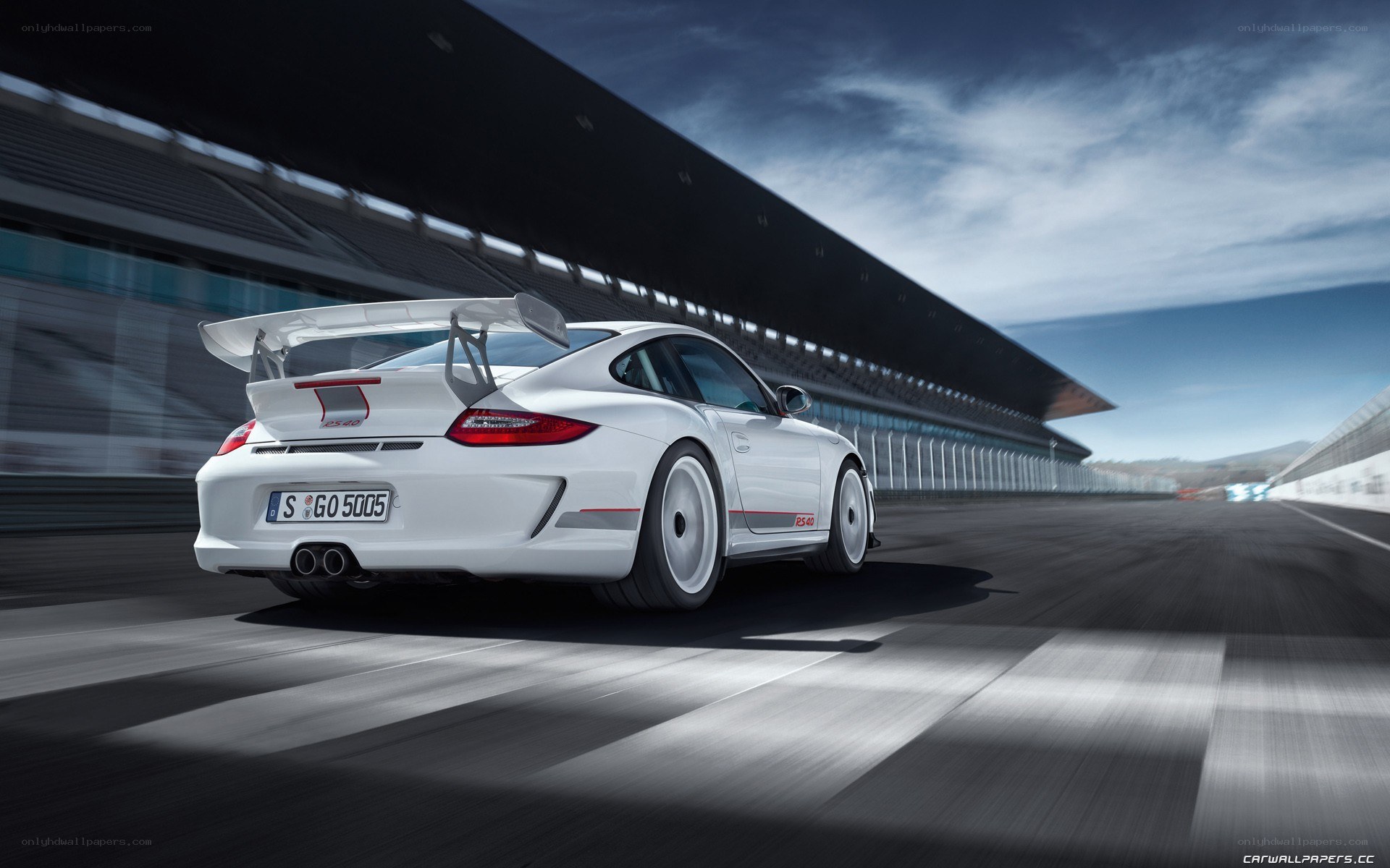white porsche on racetrack