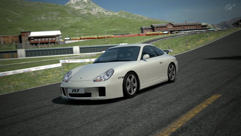 white porsche on racetrack