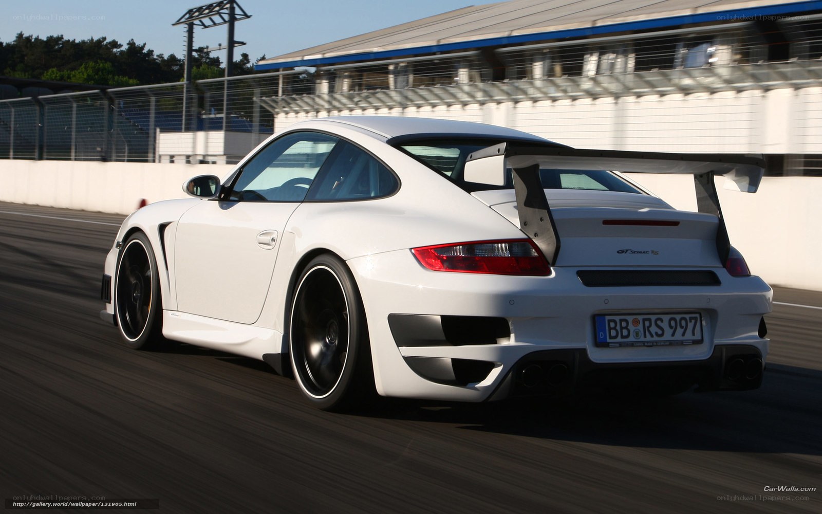 white porsche on racetrack