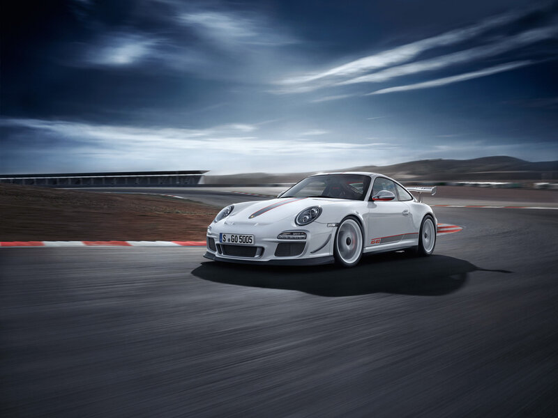 White Porsche on Racetrack — Dramatic