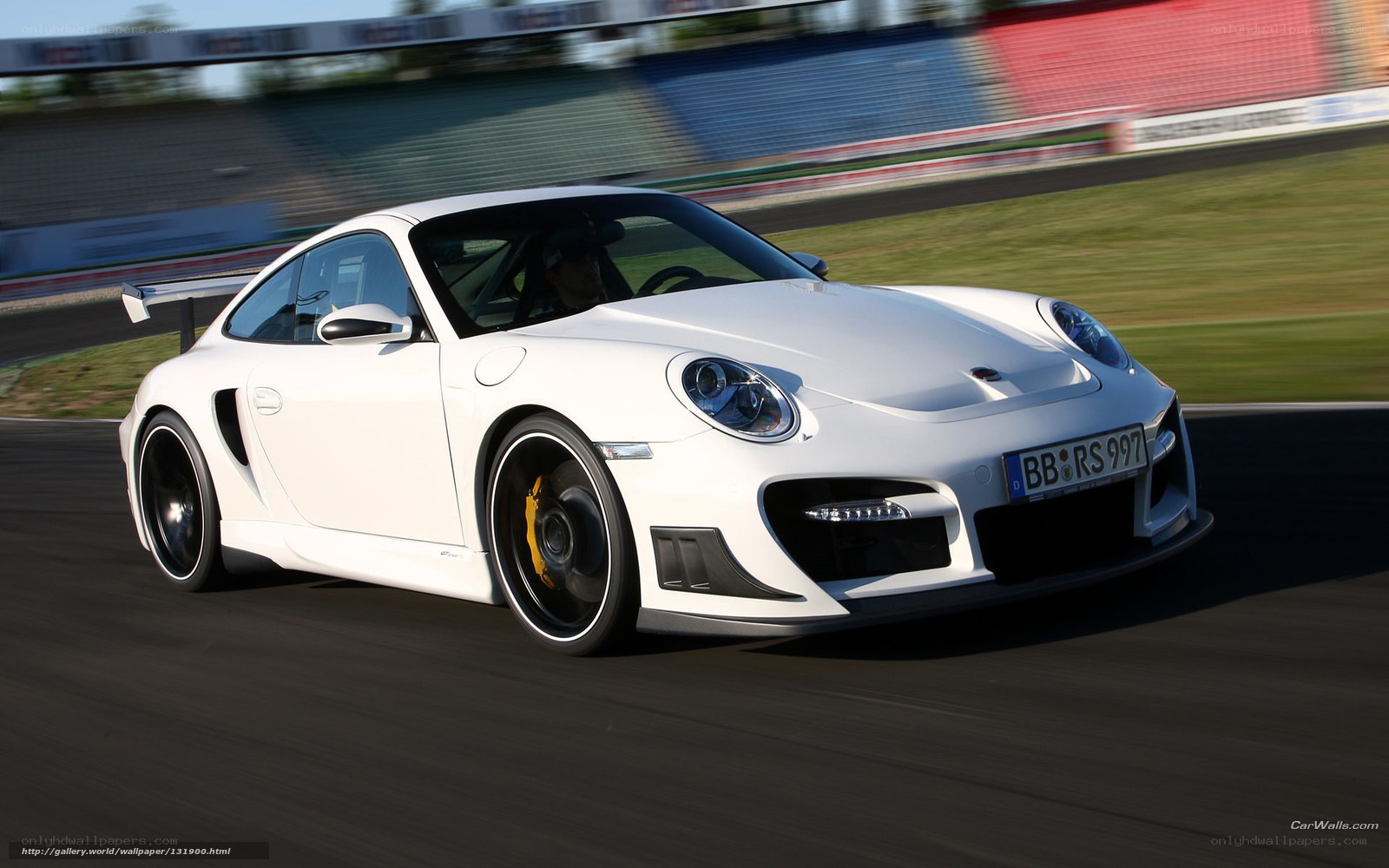 white porsche on racetrack