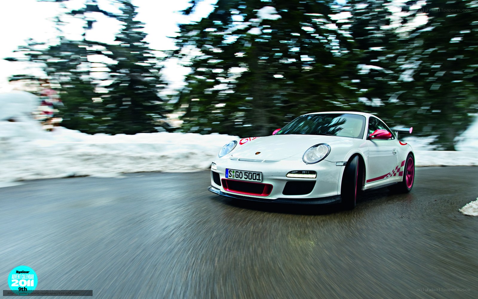 White Porsche on snowy road
