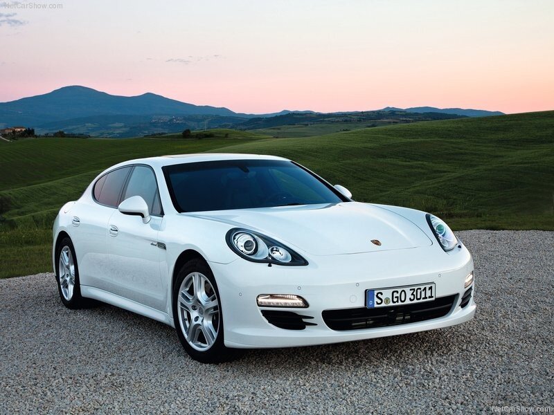 White Porsche Panamera in a scenic landscape