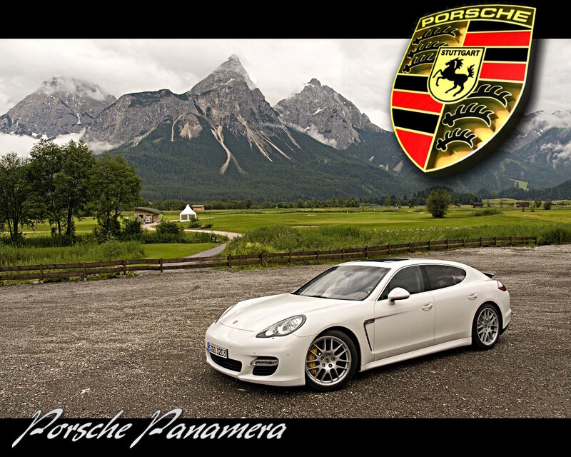 White Porsche Panamera in mountain landscape