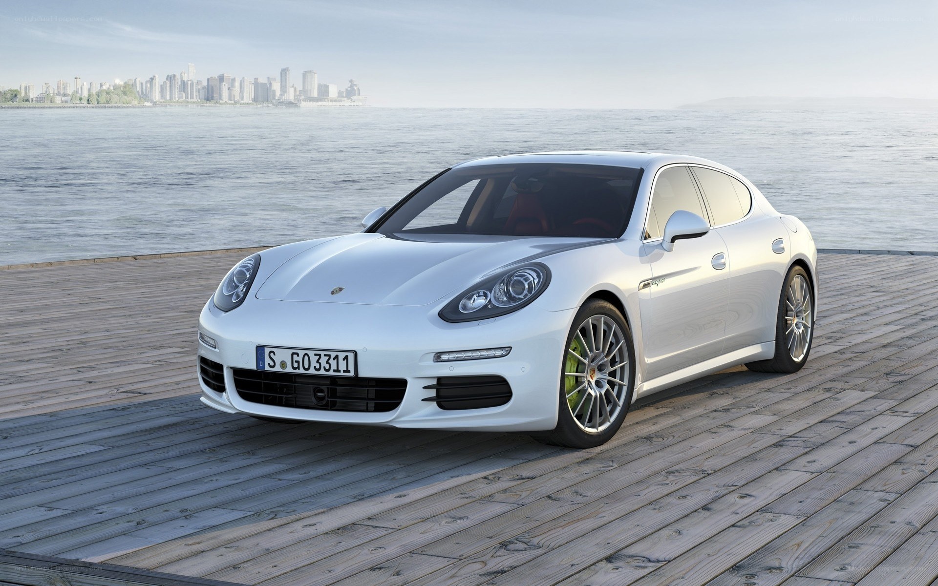 White Porsche Panamera on a dock