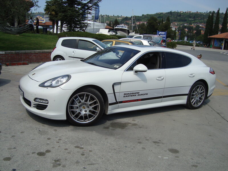 White Porsche Panamera on display