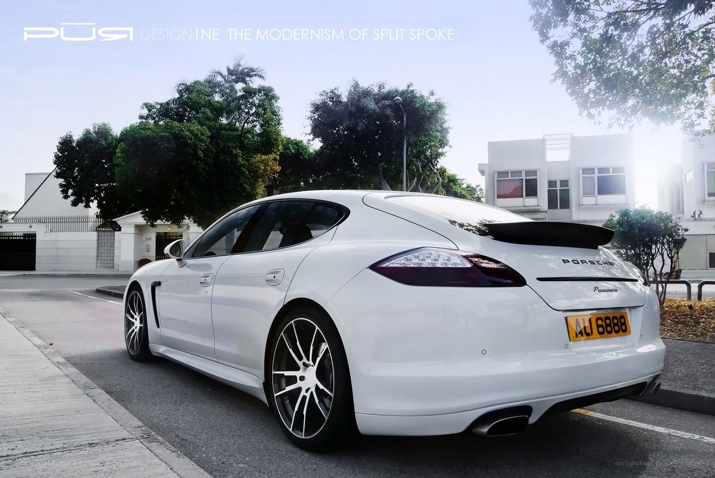 White Porsche Panamera with custom wheels