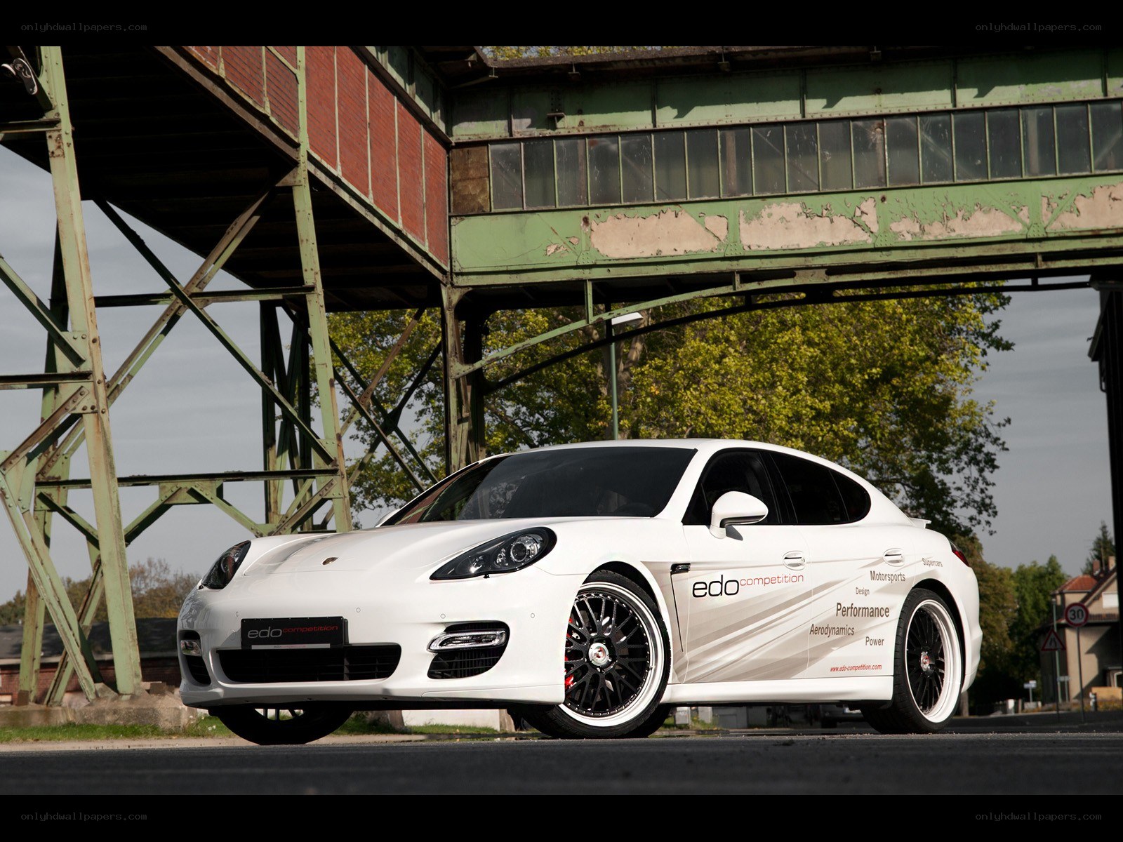 White Porsche Panamera with decals