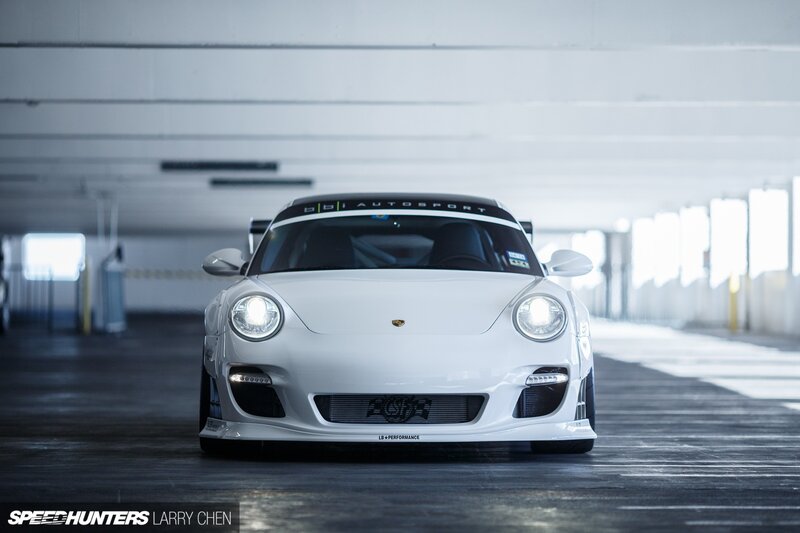 White Porsche Race Car — Dramatic, Photograph, Parking Garage