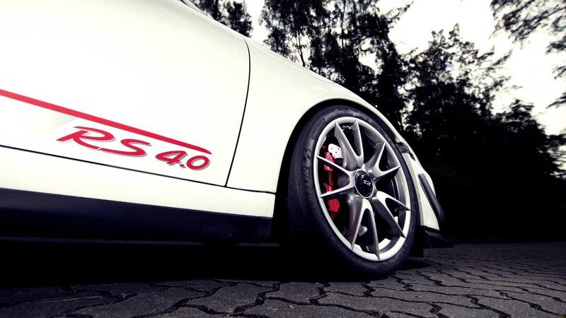 White Porsche RS 4.0 car